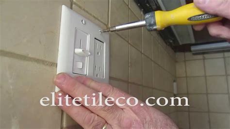 cutting electrical box in tile|how to tile outlets.